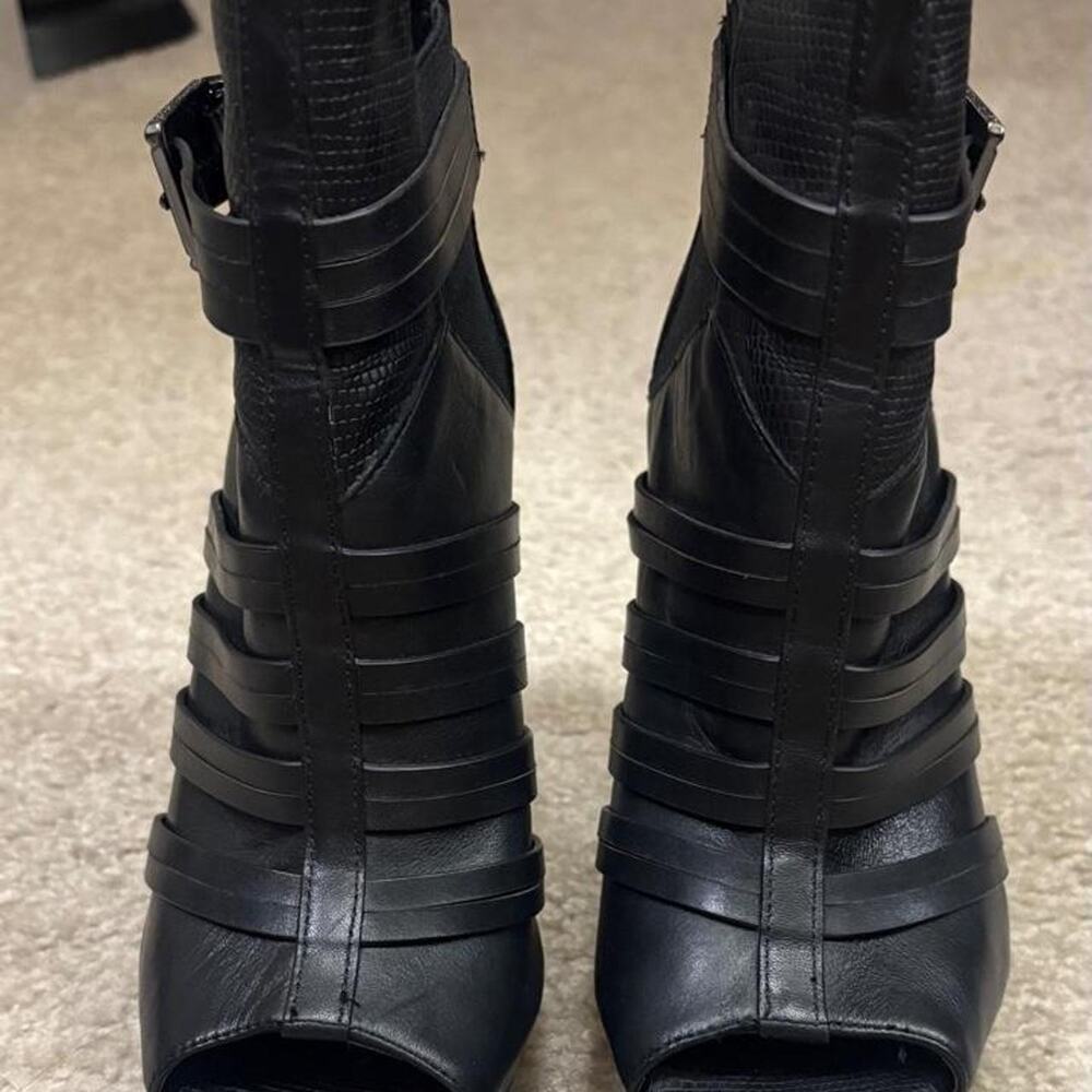 Black leather platform heels with